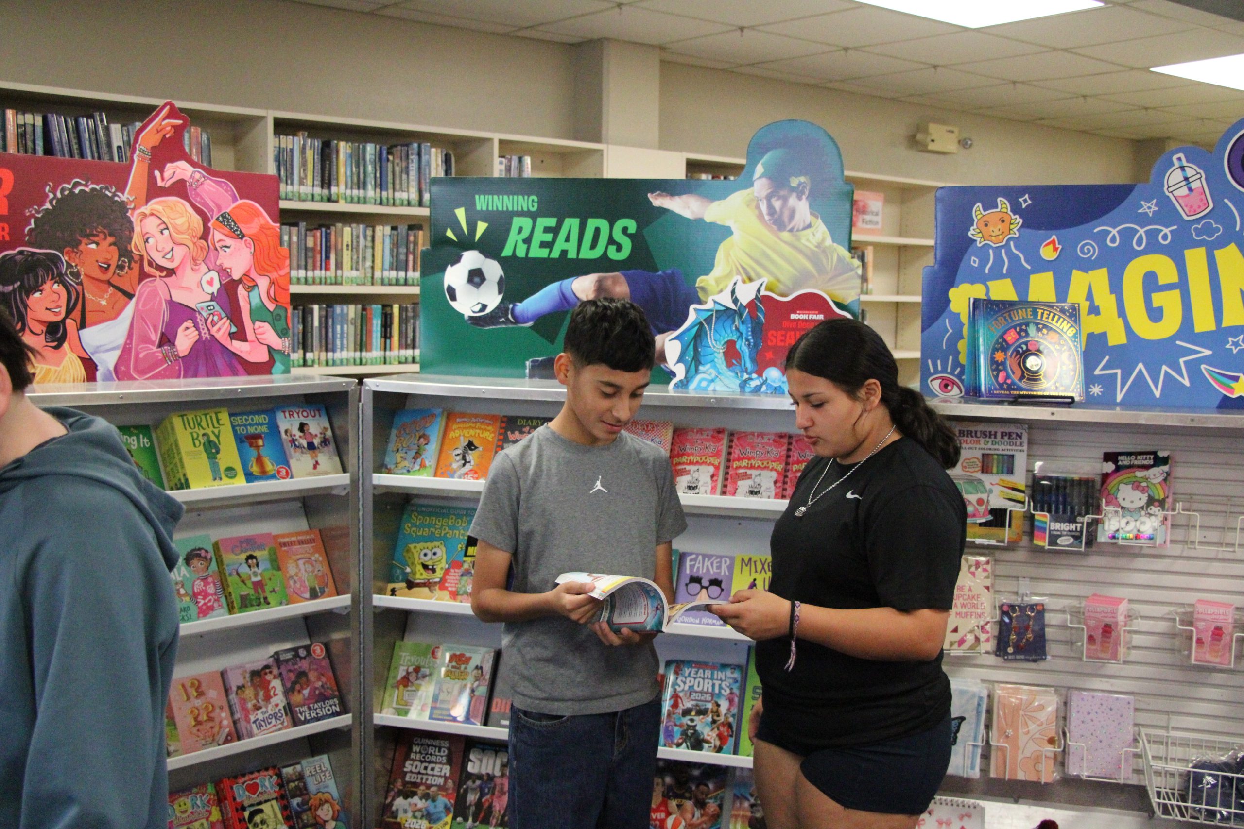 Which is better: library books or books from the book fair?